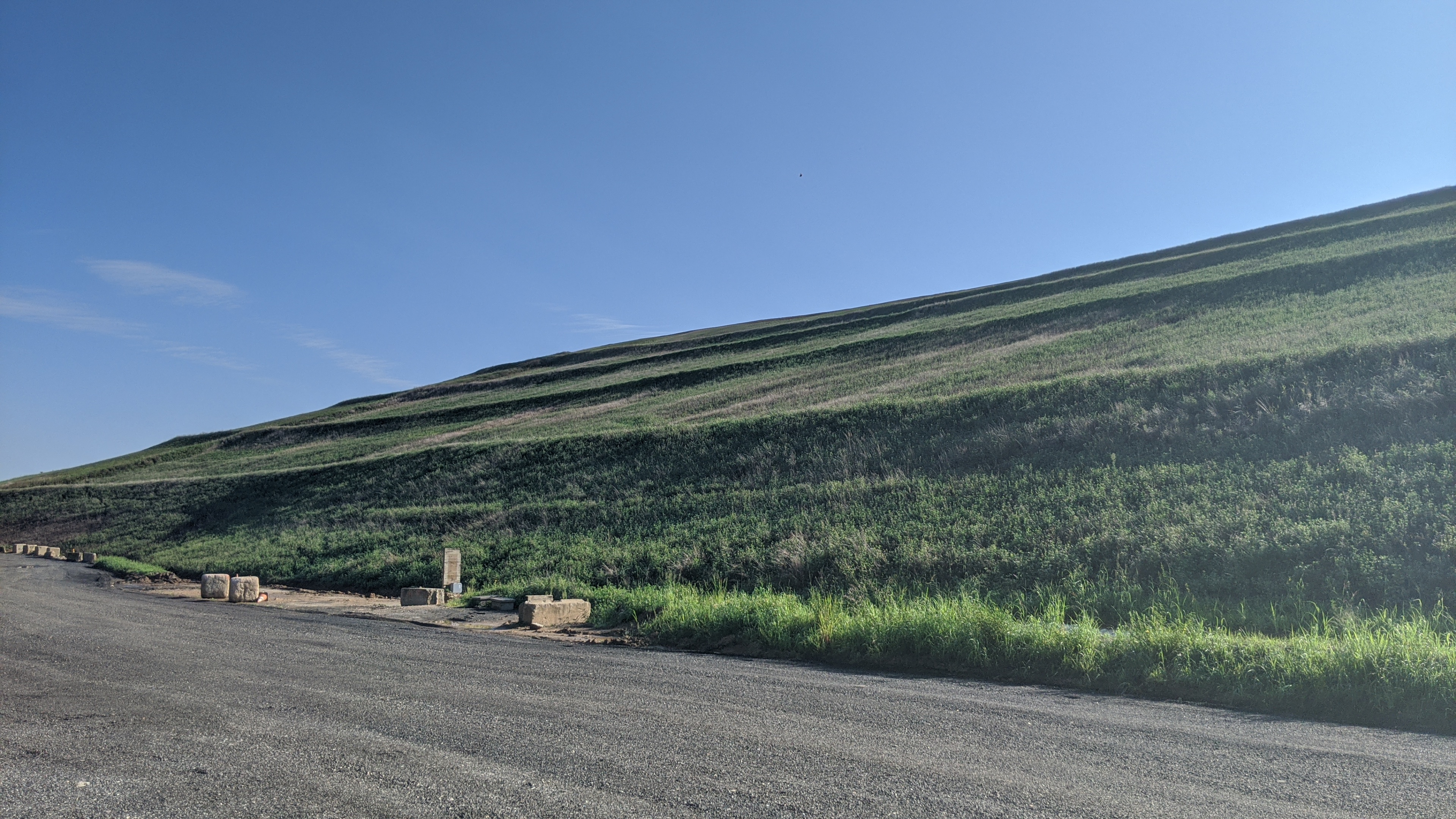 Man covering landfill